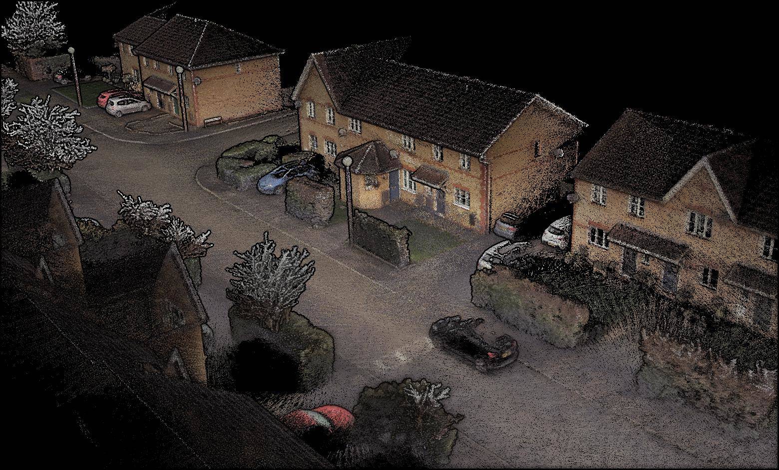 Colorized point cloud data showing a UK street lined with houses