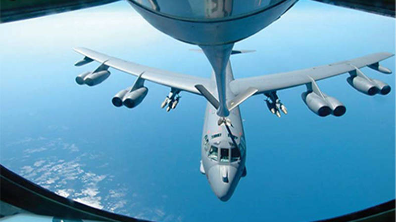 Aerial view of a flying U.S. B-52 whose engine parts were built with FARO 3D modeling tools